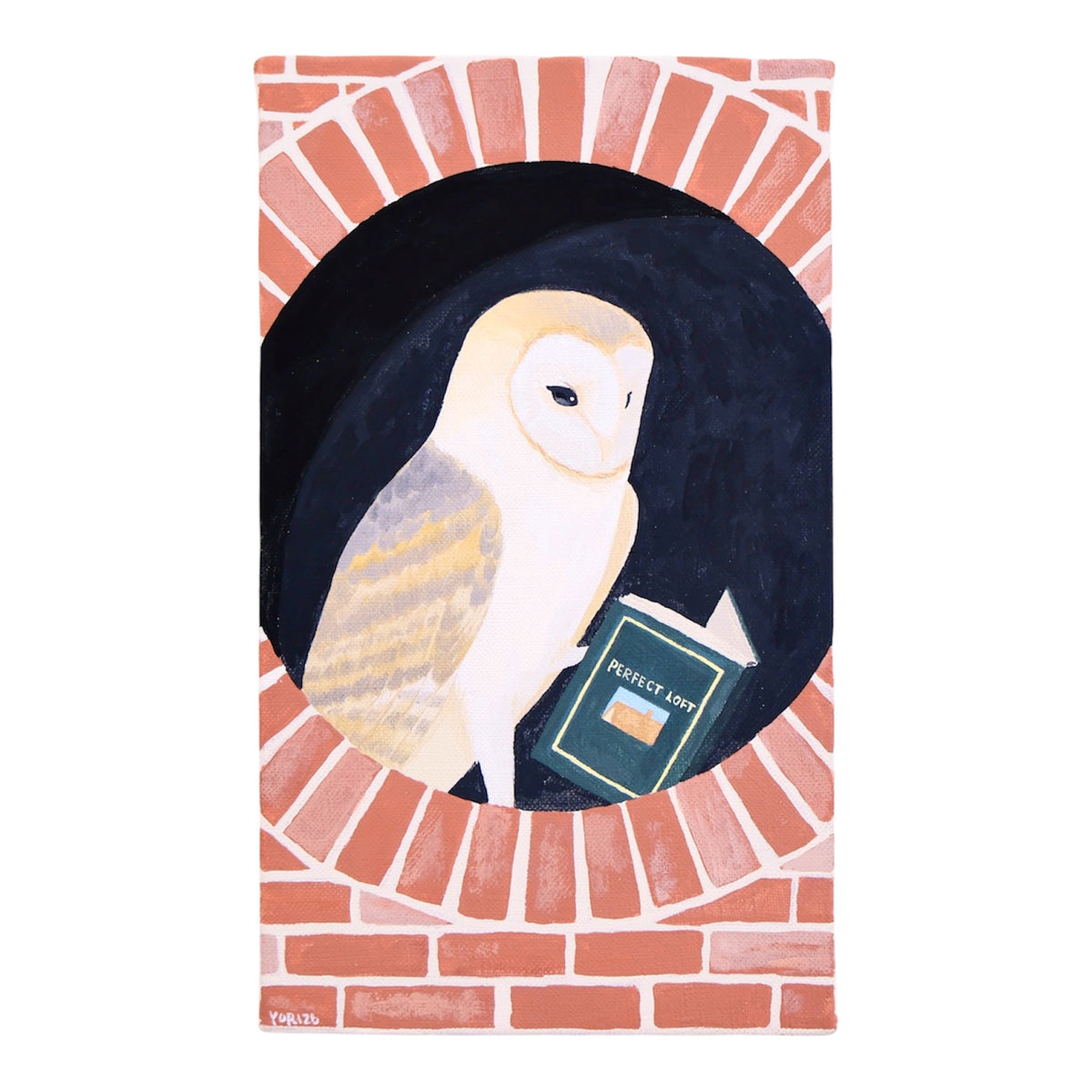 読書するメンフクロウ